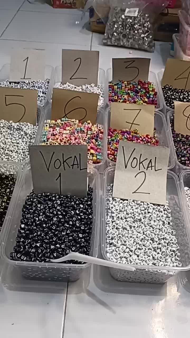 manik huruf  per cup